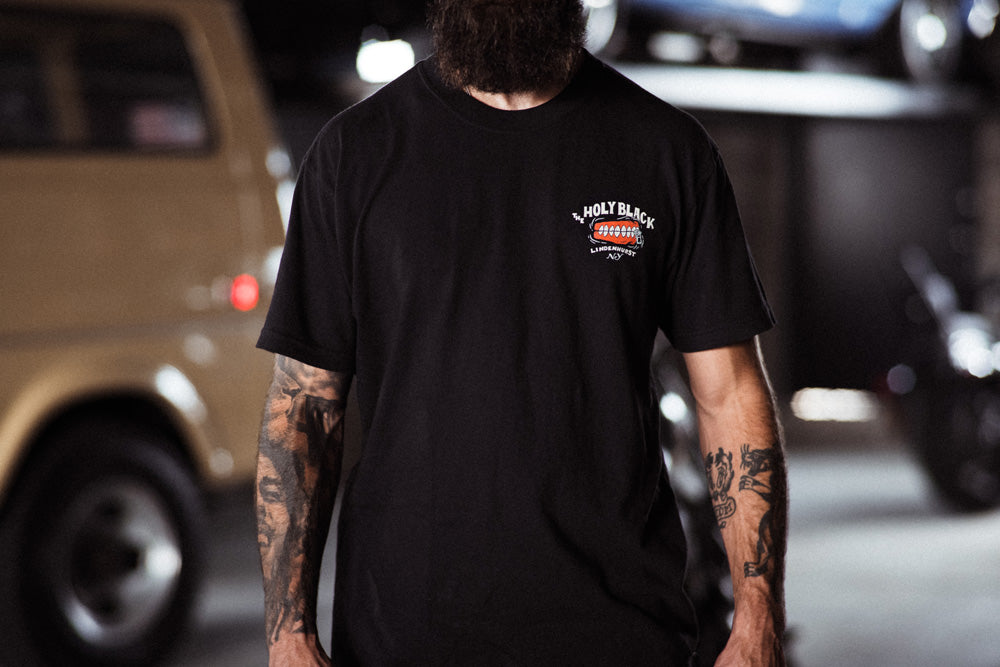 The Holy Black — men's graphic tee — close-up detail