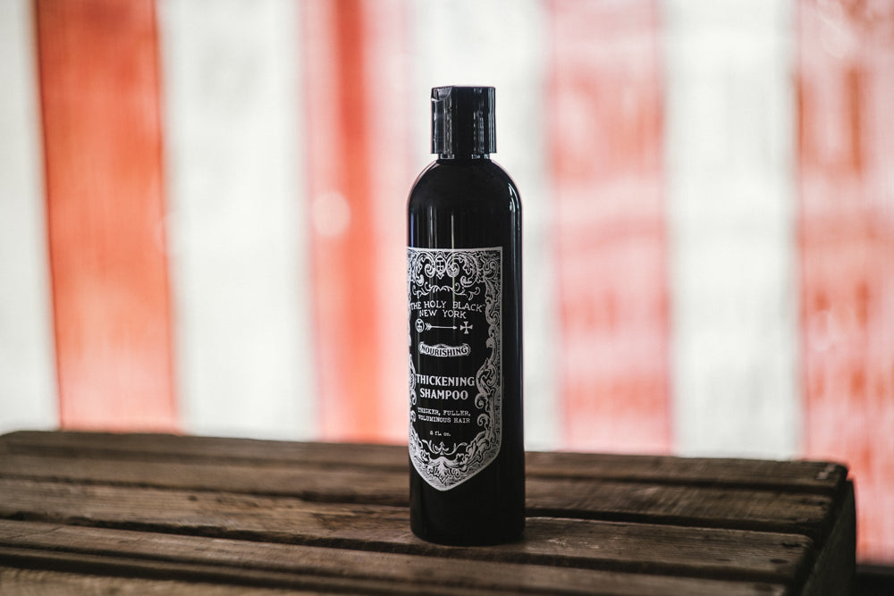 The Holy Black Thickening Shampoo product shot