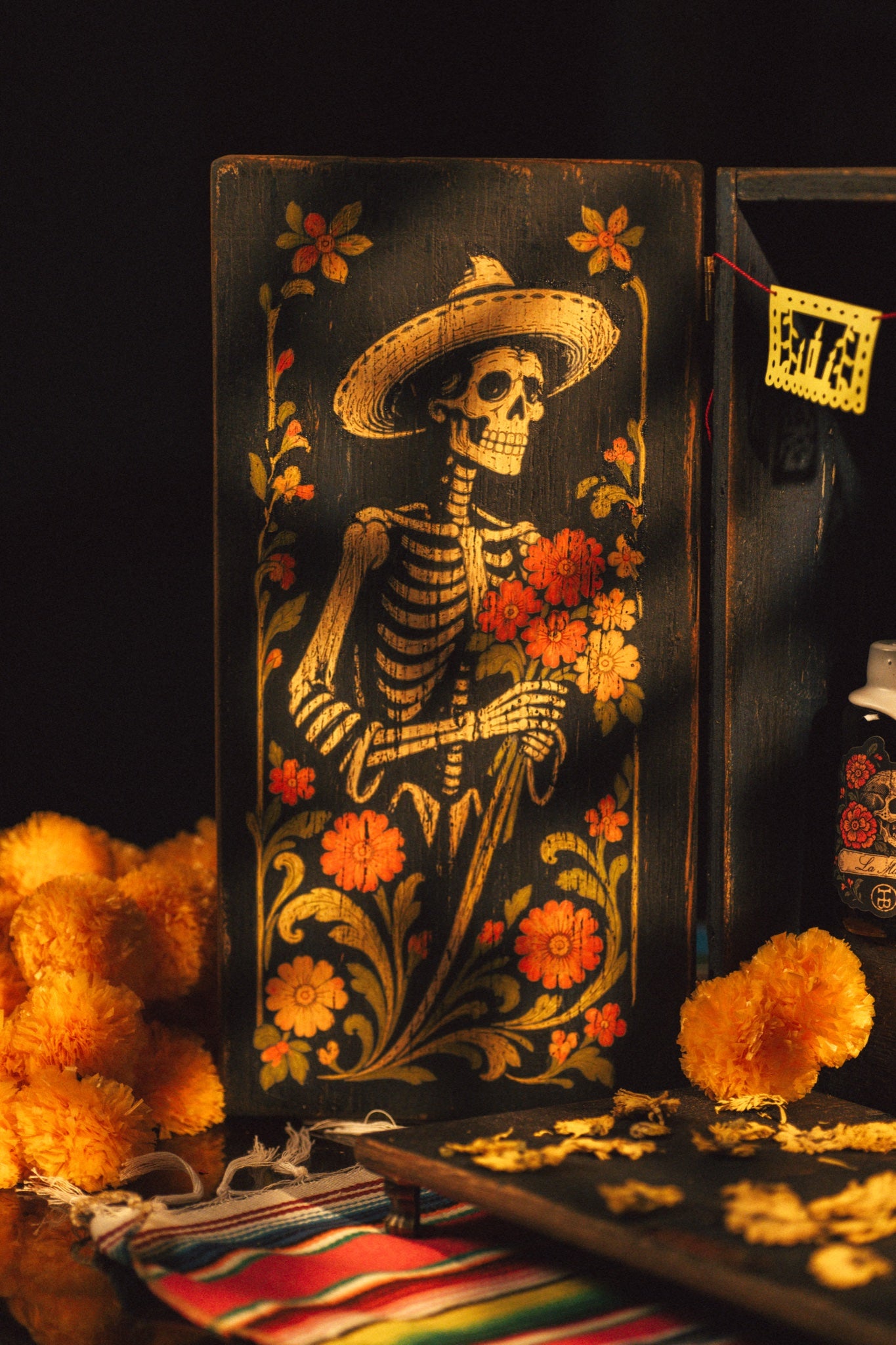 La Ofrenda by The Holy Black, door left sombrero