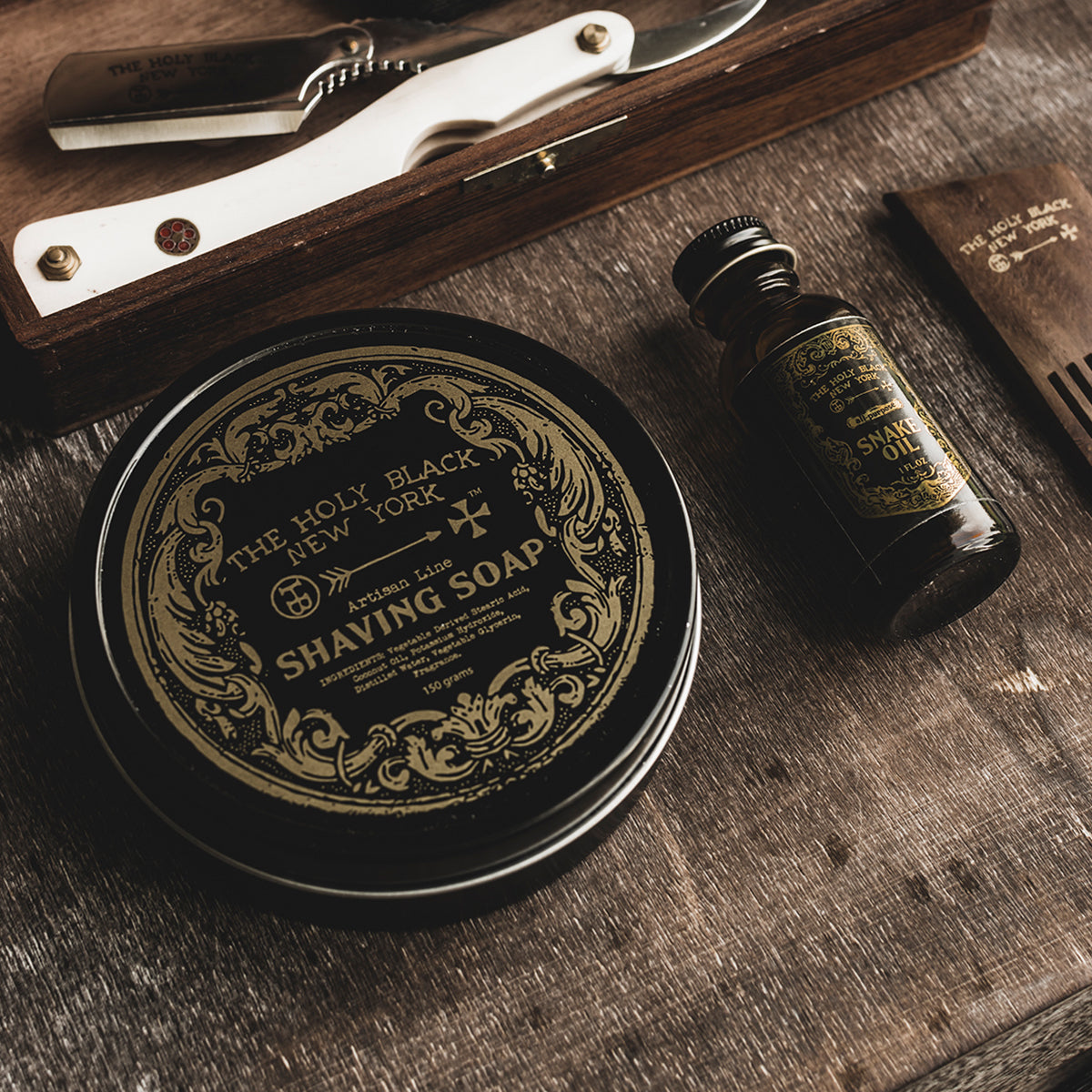 The Holy Black Artisan Shaving Soap product shot on dark surface
