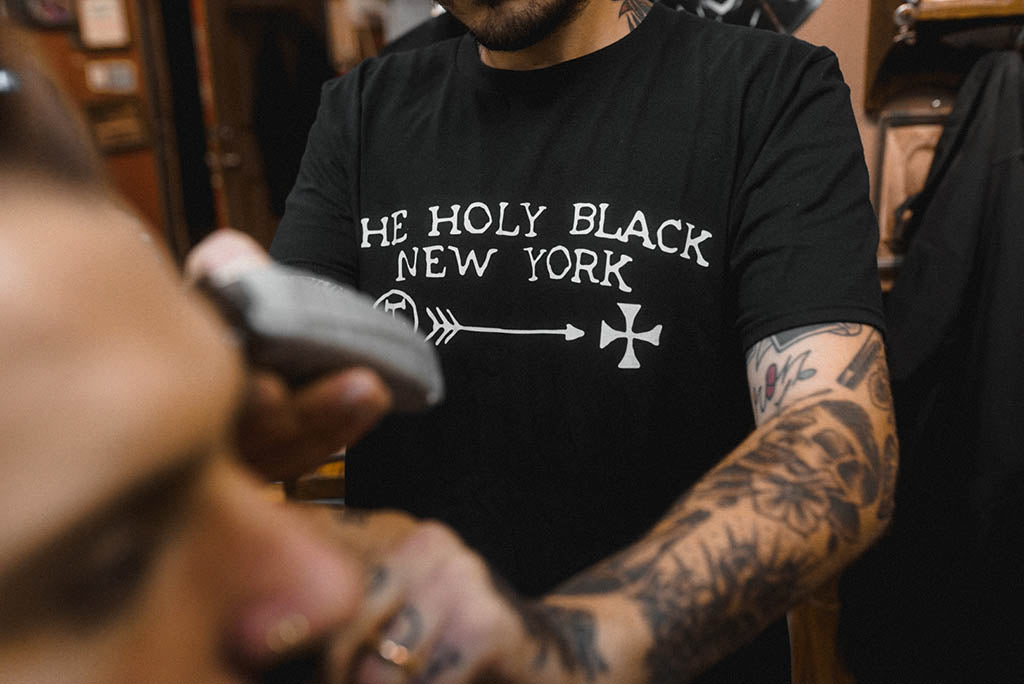 The Holy Black — men's graphic tee — lifestyle shot