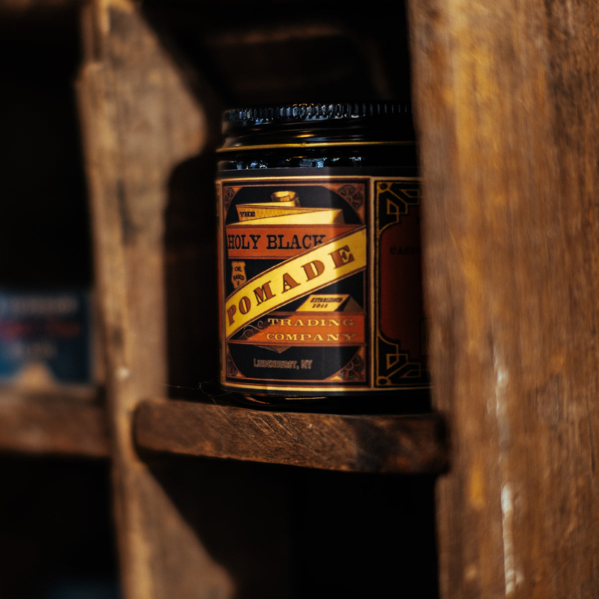 The Holy Black Secret Stash Grease Pomade — men's grooming product