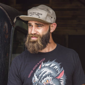 The Holy Black Five Panel Classic — men's grooming product — product photo