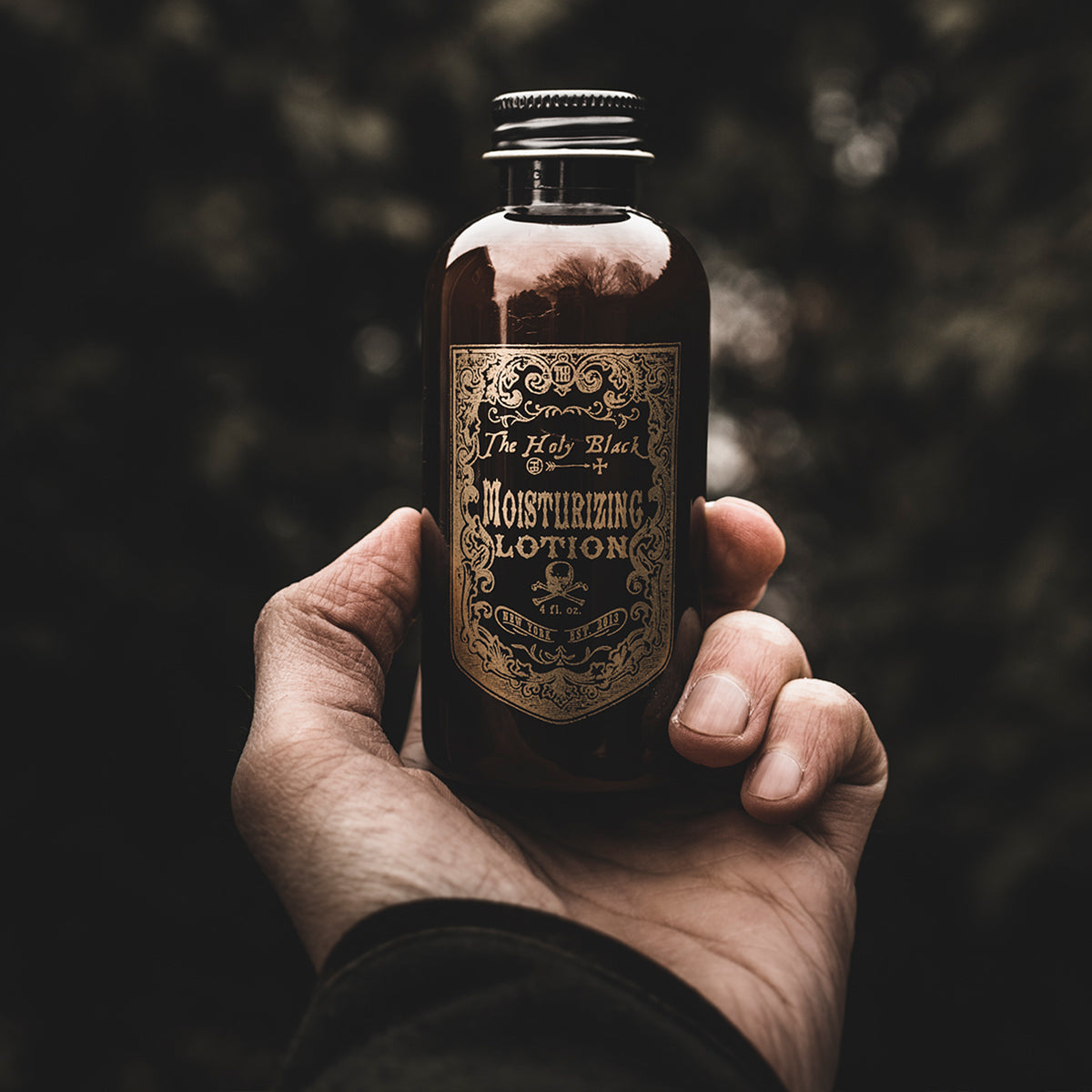 The Holy Black Moisturizing Lotion — men's daily face and body moisturizer