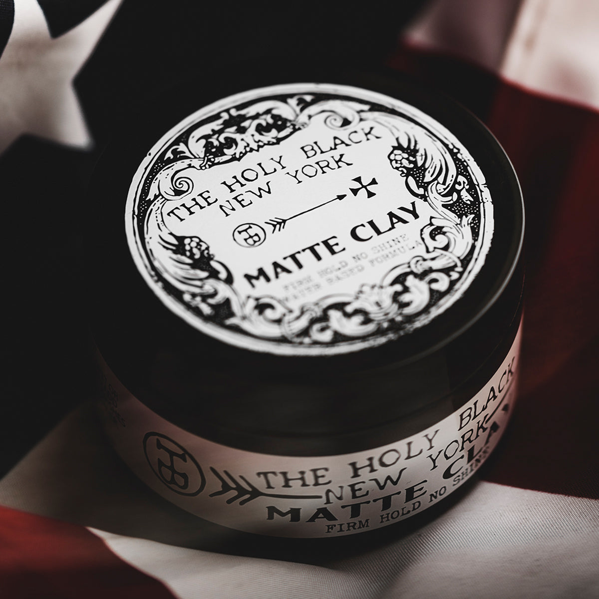 The Holy Black Matte Clay Hair Pomade — men's clay pomade with strong hold and matte finish