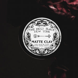 The Holy Black Matte Clay Hair Pomade — clay-based styling product for men