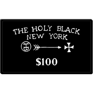 The Holy Black THB Gift Cards — men's grooming product — in use