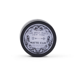 The Holy Black Matte Clay Hair Pomade — men's clay pomade with strong hold and matte finish