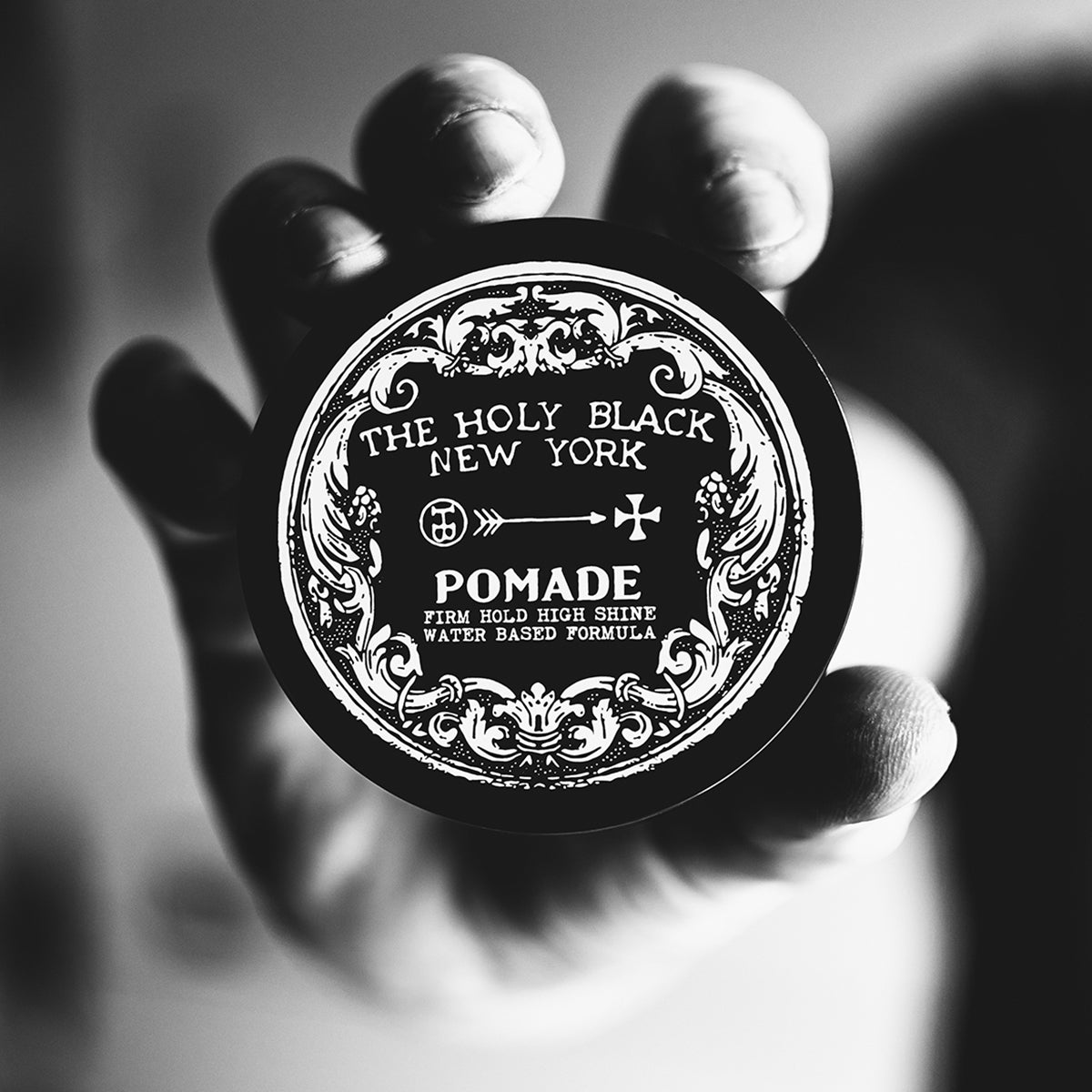The Holy Black High Shine Pomade jar detail — classic hair pomade